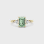Yellow gold Three-Stone Fancy Green Emerald Cut Diamond Ring with Trillion Side Stones