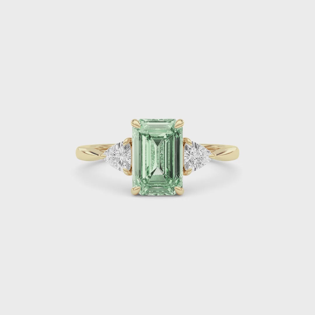 Yellow gold Three-Stone Fancy Green Emerald Cut Diamond Ring with Trillion Side Stones