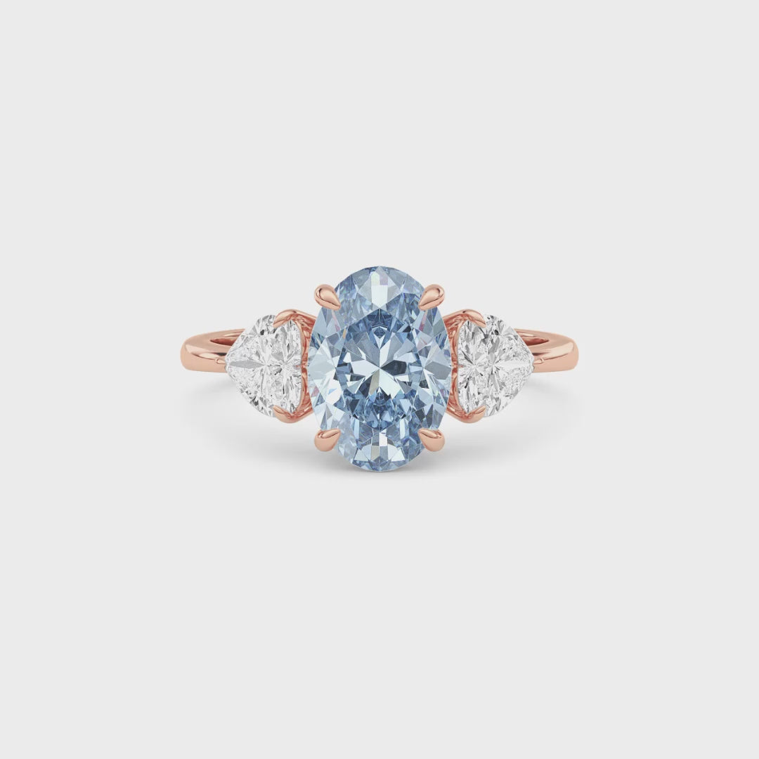 Rose gold Three-Stone Fancy Blue Oval Cut Diamond Ring with Heart Side Stones