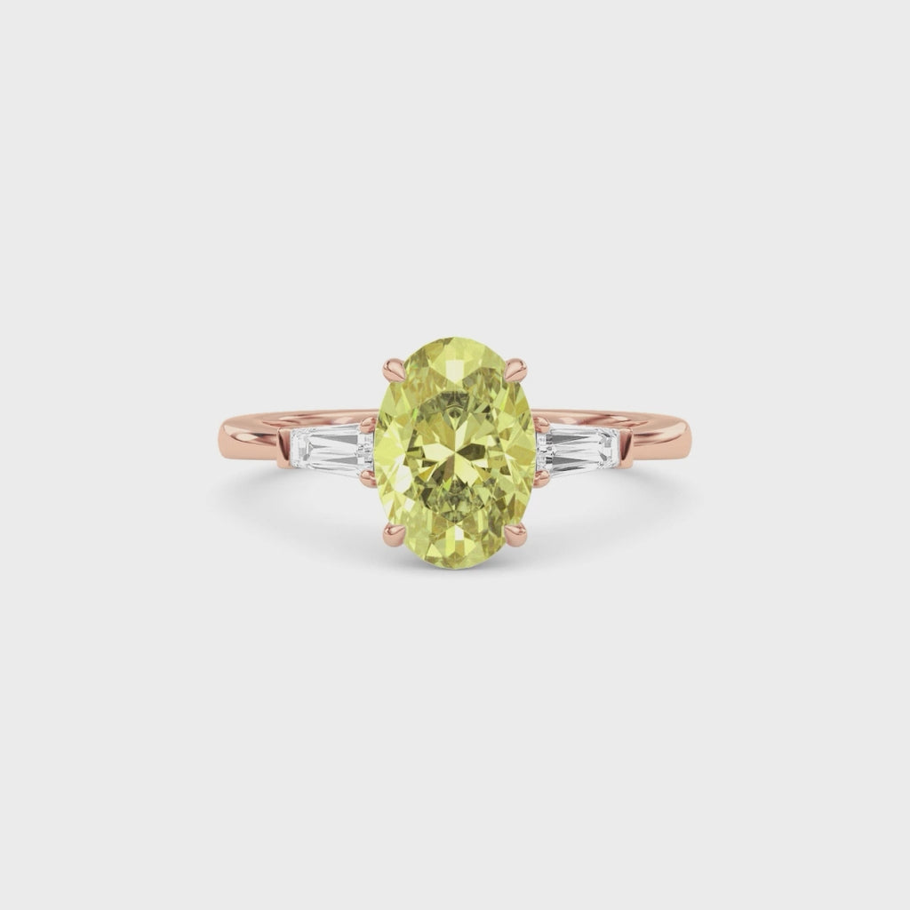 Rose gold Three-Stone Fancy Yellow Oval Cut Diamond Ring with Tapered Baguette Side Stones