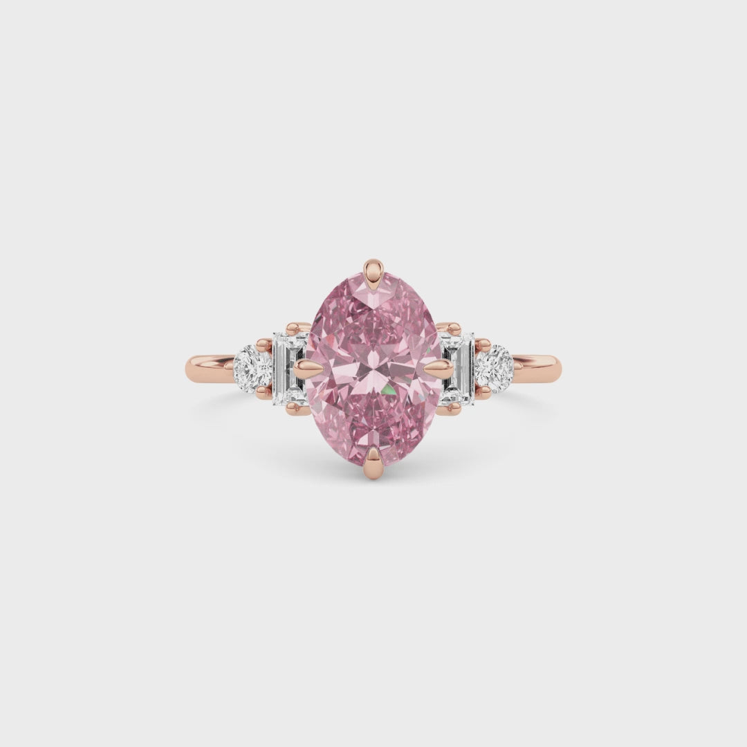 Rose gold Fancy Pink Oval Cut Three Stone Diamond Engagement Ring with Tapered Baguette and Round Side Stones