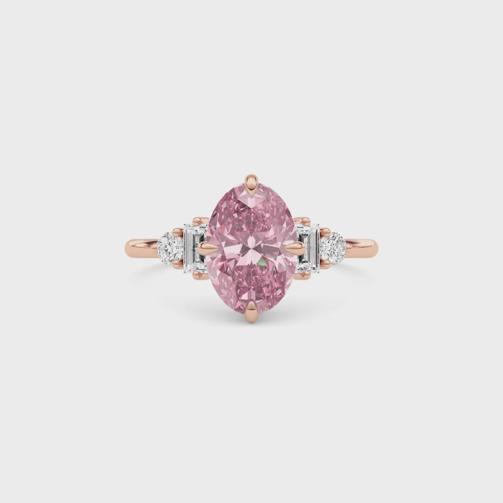 Rose gold Fancy Pink Oval Cut Three Stone Diamond Engagement Ring with Tapered Baguette and Round Side Stones