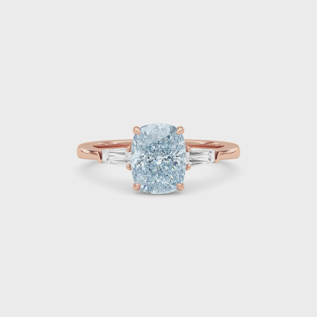 Rose gold Three-Stone Fancy Blue Cushion Cut Diamond Ring with Tapered Baguette Side Stones