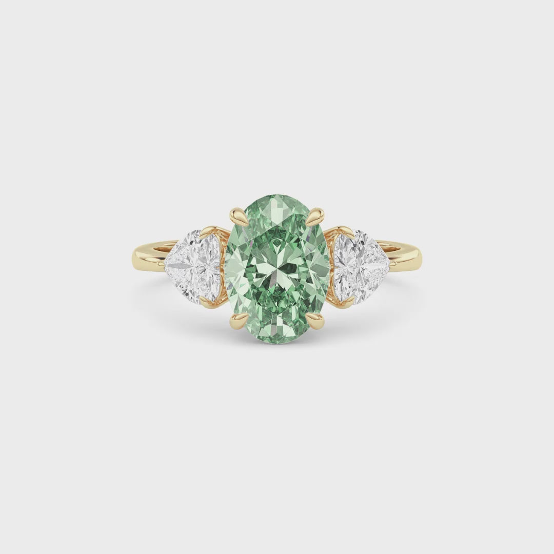 Yellow gold Three-Stone Fancy Green Oval Cut Diamond Ring with Heart Side Stones