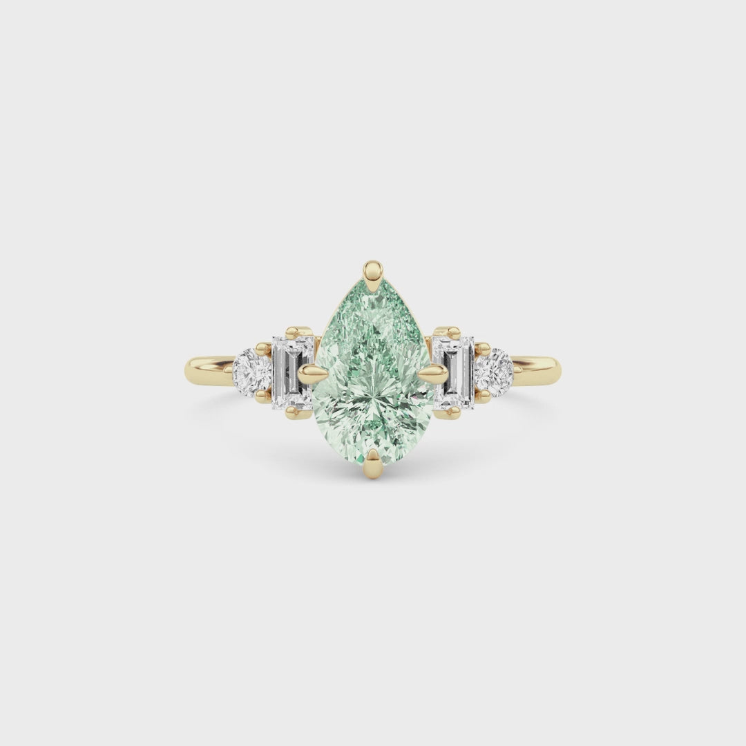 Yellow gold Fancy Green Pear Cut Three Stone Diamond Engagement Ring with Tapered Baguette and Round Side Stones