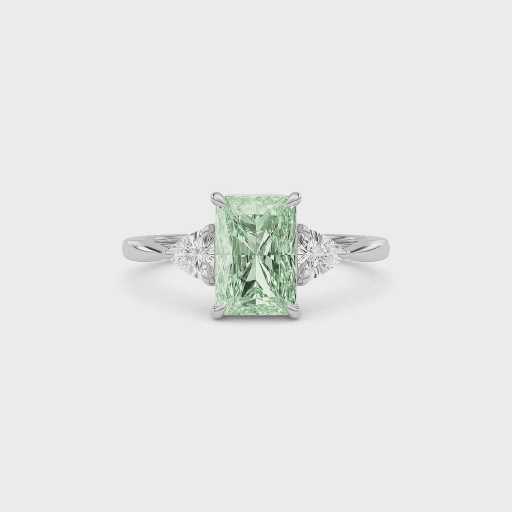 Platinum Three-Stone Fancy Green Radiant Cut Diamond Ring with Trillion Side Stones