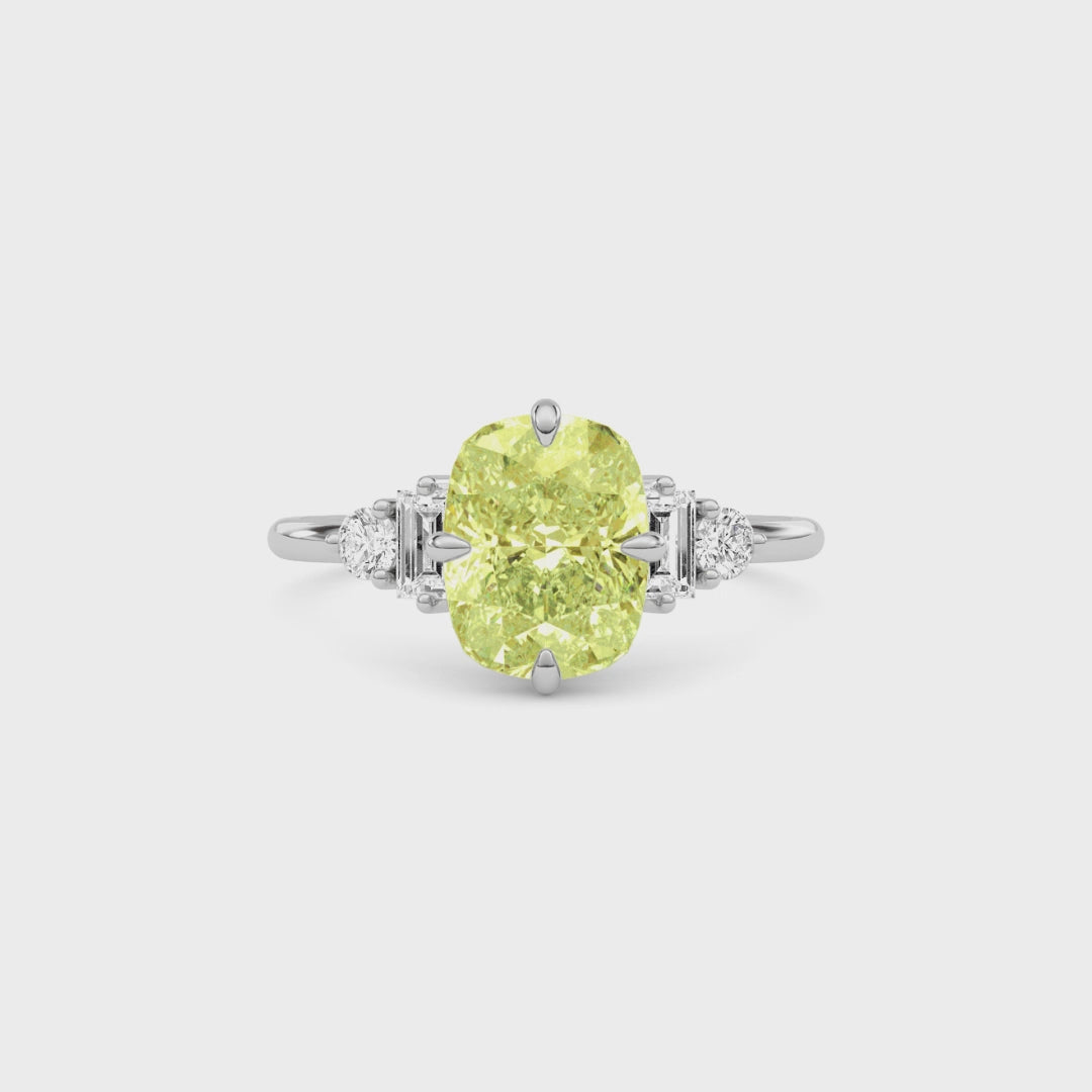 Yellow gold Fancy Yellow Cushion Cut Three Stone Diamond Engagement Ring with Tapered Baguette and Round Side Stones