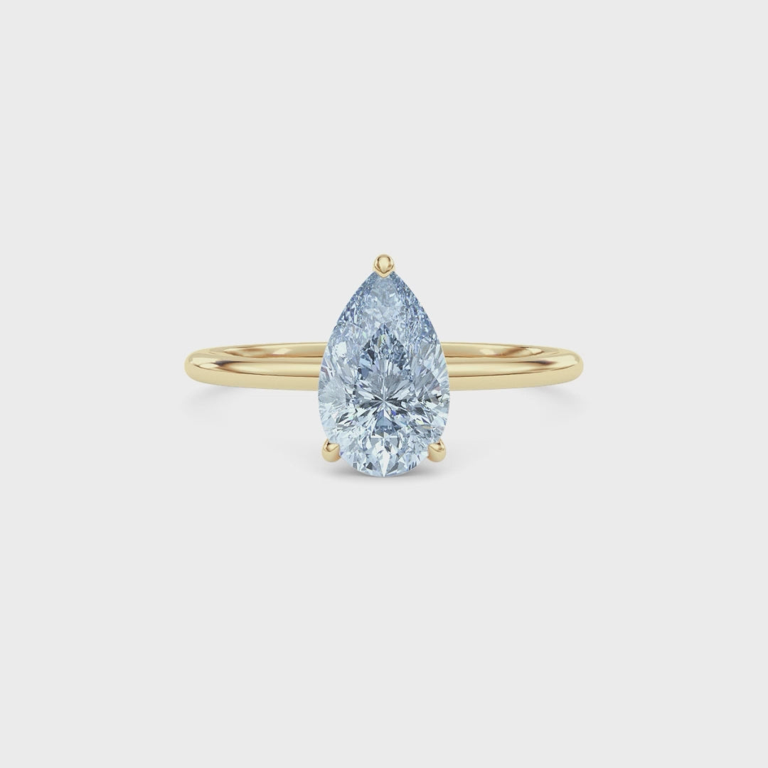 Yellow gold Fancy Blue Pear Cut Diamond Hidden Halo Solitaire Engagement Ring with Prong Setting