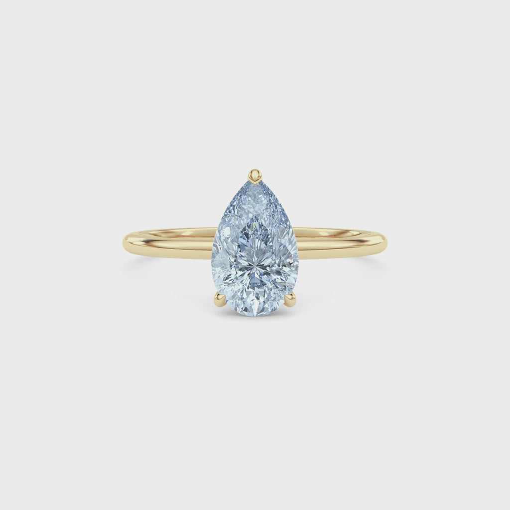 Yellow gold Fancy Blue Pear Cut Diamond Hidden Halo Solitaire Engagement Ring with Prong Setting