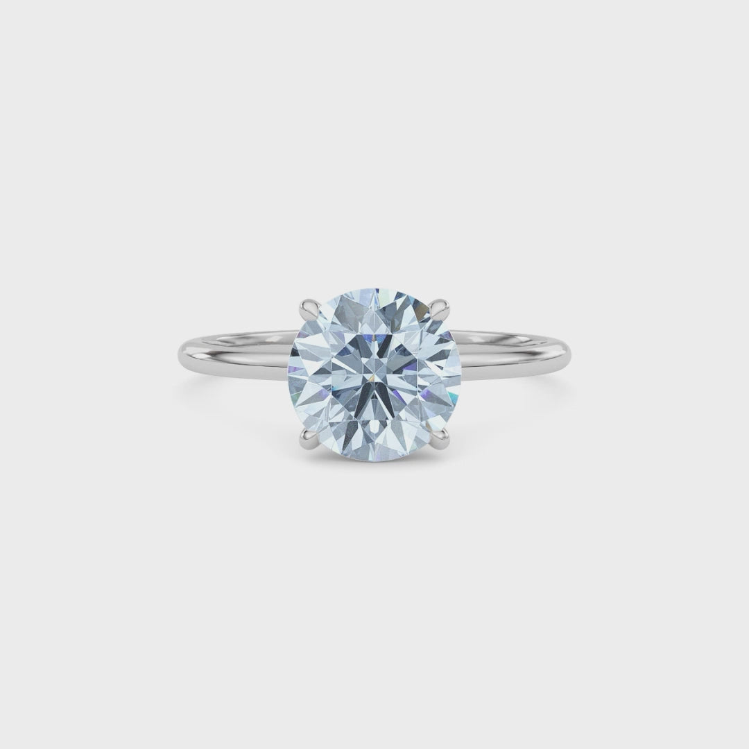 White gold Fancy Blue Round Cut Diamond Hidden Halo Solitaire Engagement Ring with Prong Setting