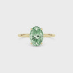 Yellow gold Fancy Green Oval Cut Diamond Hidden Halo Solitaire Engagement Ring with Prong Setting
