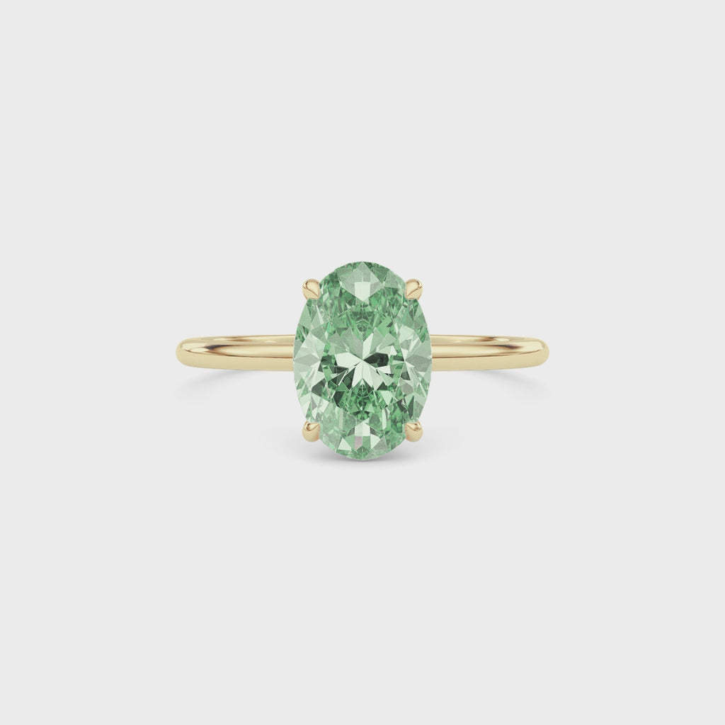 Yellow gold Fancy Green Oval Cut Diamond Hidden Halo Solitaire Engagement Ring with Prong Setting