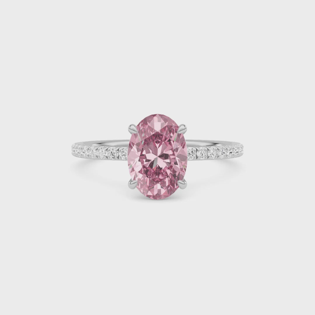White gold Fancy Pink Oval Cut Diamond Solitaire with Pavé Band
