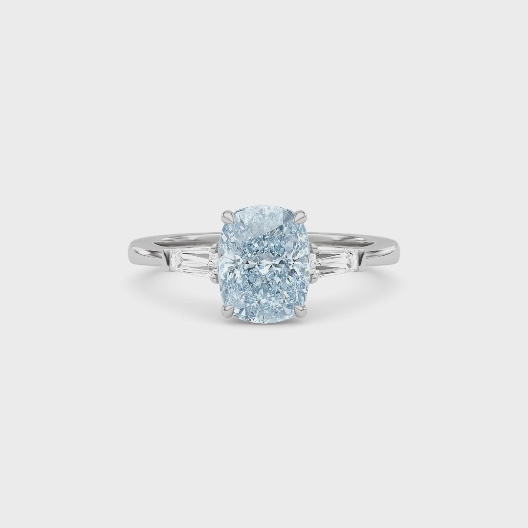 White gold Three-Stone Fancy Blue Cushion Cut Diamond Ring with Tapered Baguette Side Stones