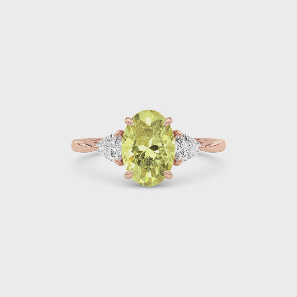 Rose gold Three-Stone Fancy Yellow Oval Cut Diamond Ring with Trillion Side Stones