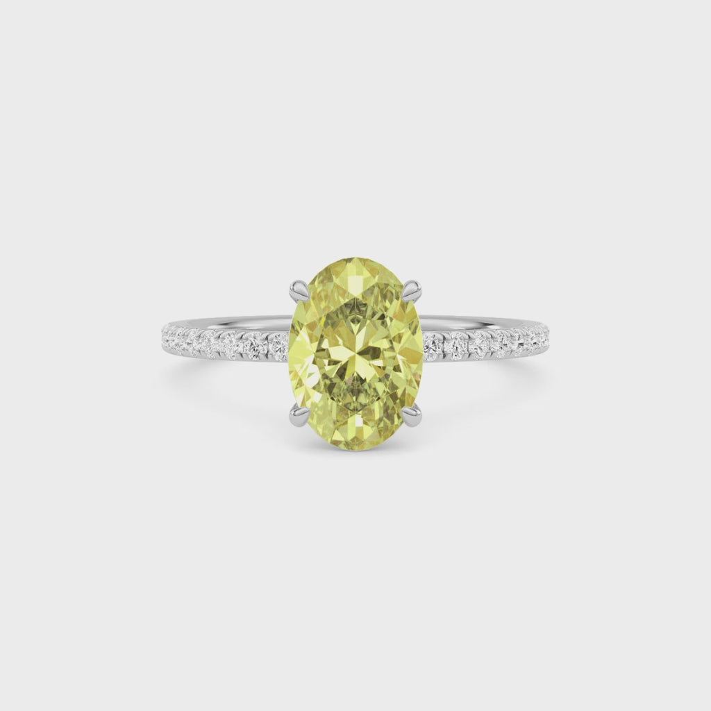 Yellow gold Fancy Yellow Oval Cut Diamond Solitaire with Pavé Band