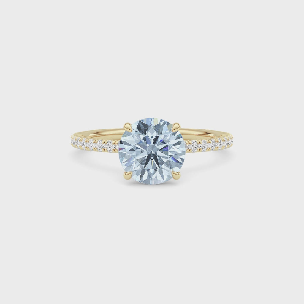 Yellow gold Fancy Blue Round Cut Diamond Solitaire with Pavé Band