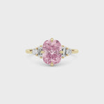 Yellow gold Fancy Pink Cushion Cut Three Stone Diamond Engagement Ring with Tapered Baguette and Round Side Stones