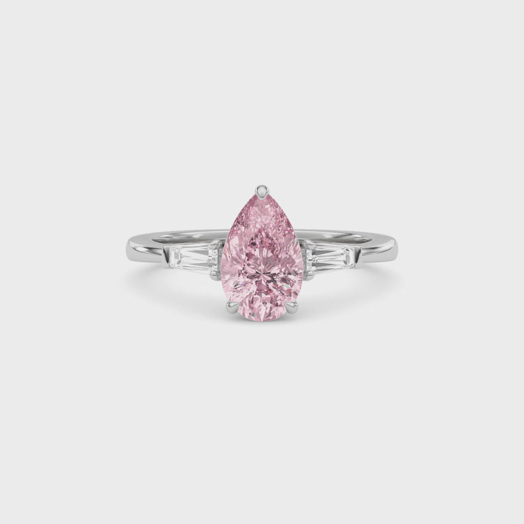 White gold Three-Stone Fancy Pink Pear Cut Diamond Ring with Tapered Baguette Side Stones