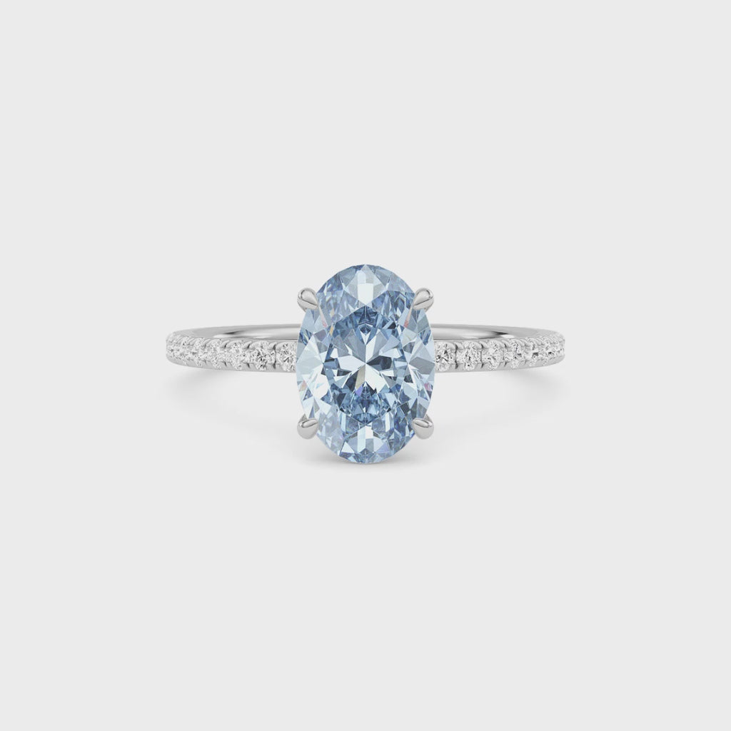 Platinum Fancy Blue Oval Cut Diamond Solitaire with Pavé Band