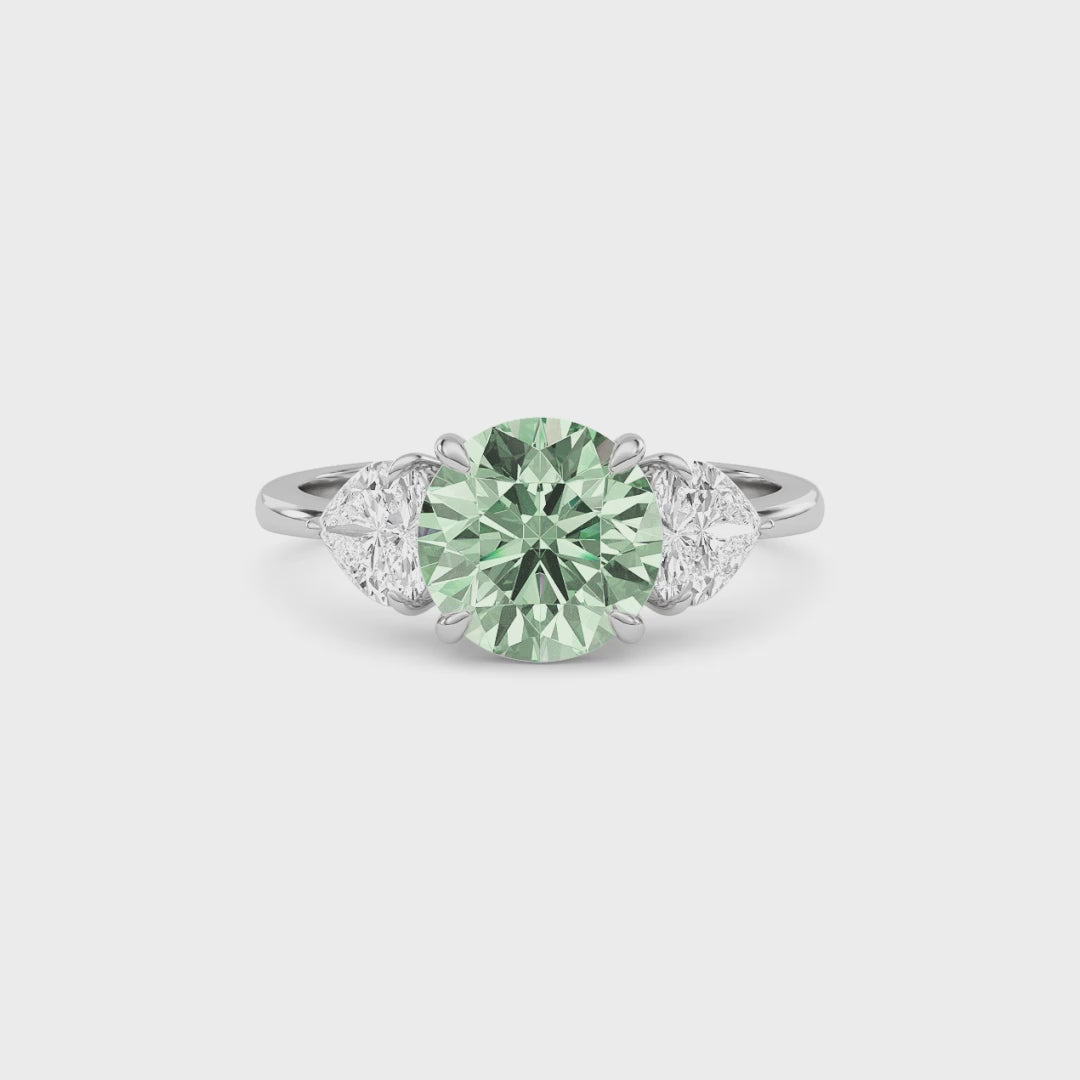 White gold Three-Stone Fancy Green Round Cut Diamond Ring with Heart Side Stones