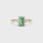 Yellow gold Three-Stone Fancy Green Emerald Cut Diamond Ring with Tapered Baguette Side Stones