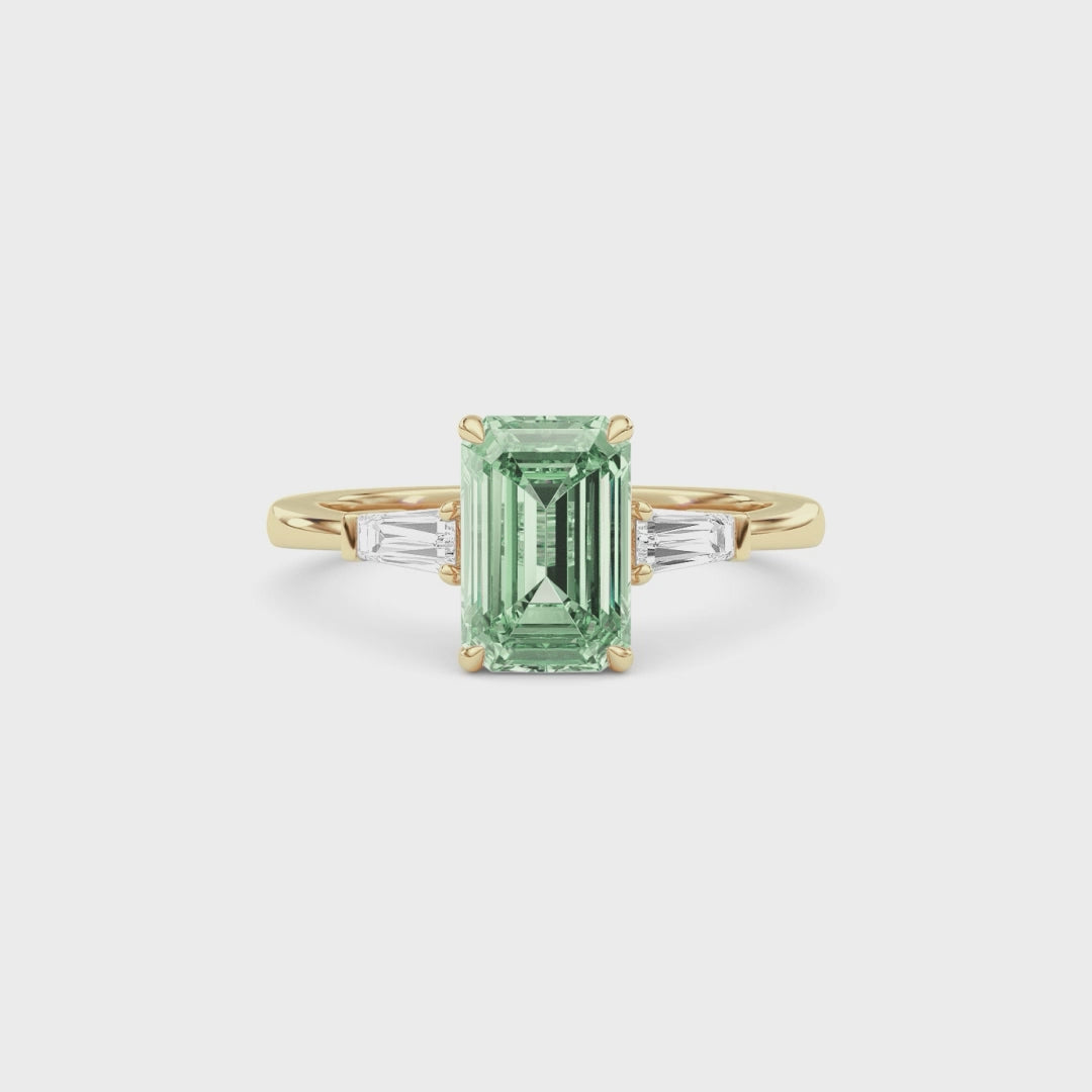 Yellow gold Three-Stone Fancy Green Emerald Cut Diamond Ring with Tapered Baguette Side Stones