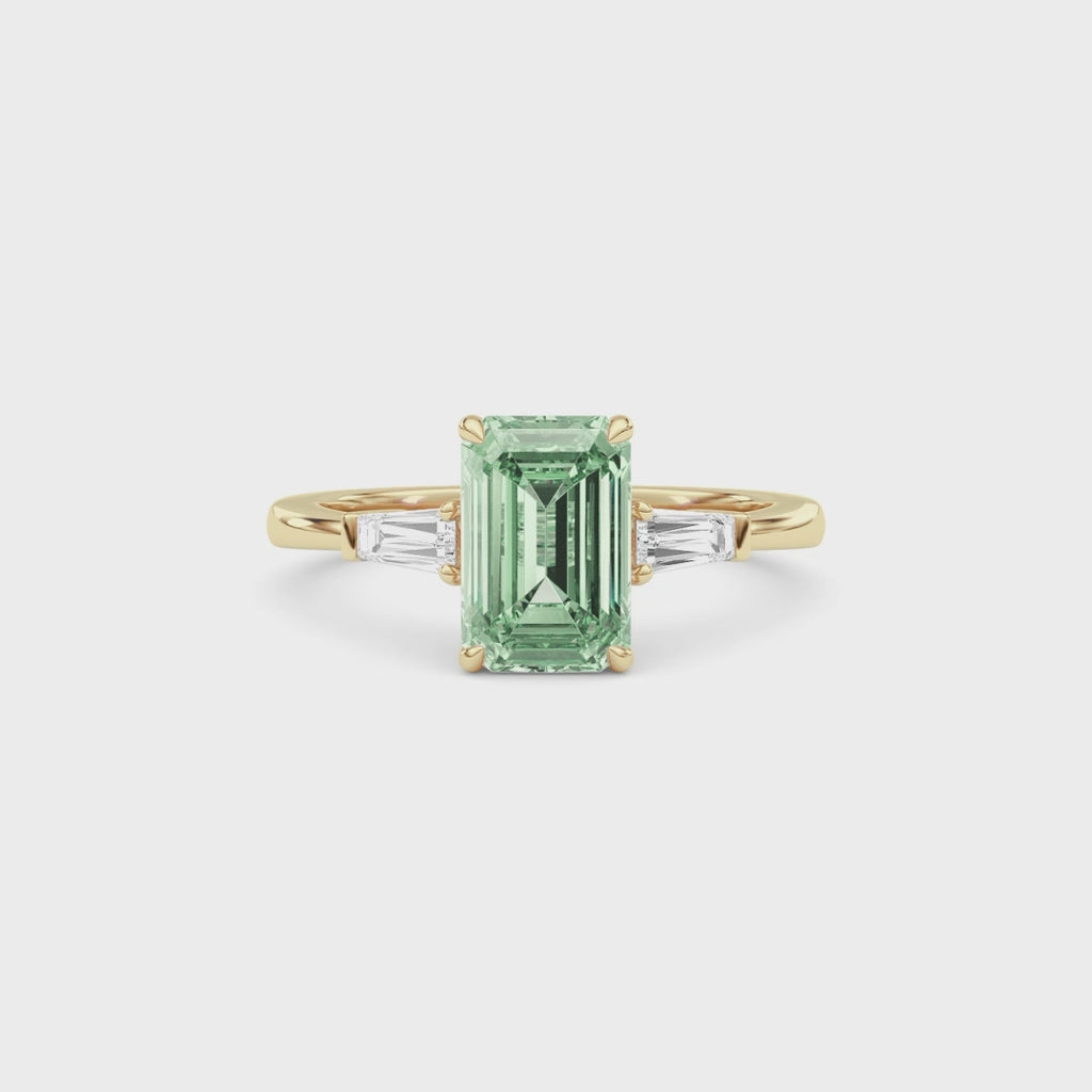 Yellow gold Three-Stone Fancy Green Emerald Cut Diamond Ring with Tapered Baguette Side Stones