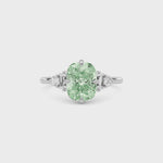 White gold Fancy Green Cushion Cut Three Stone Diamond Engagement Ring with Tapered Baguette and Round Side Stones
