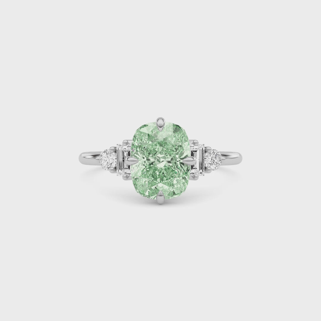 White gold Fancy Green Cushion Cut Three Stone Diamond Engagement Ring with Tapered Baguette and Round Side Stones