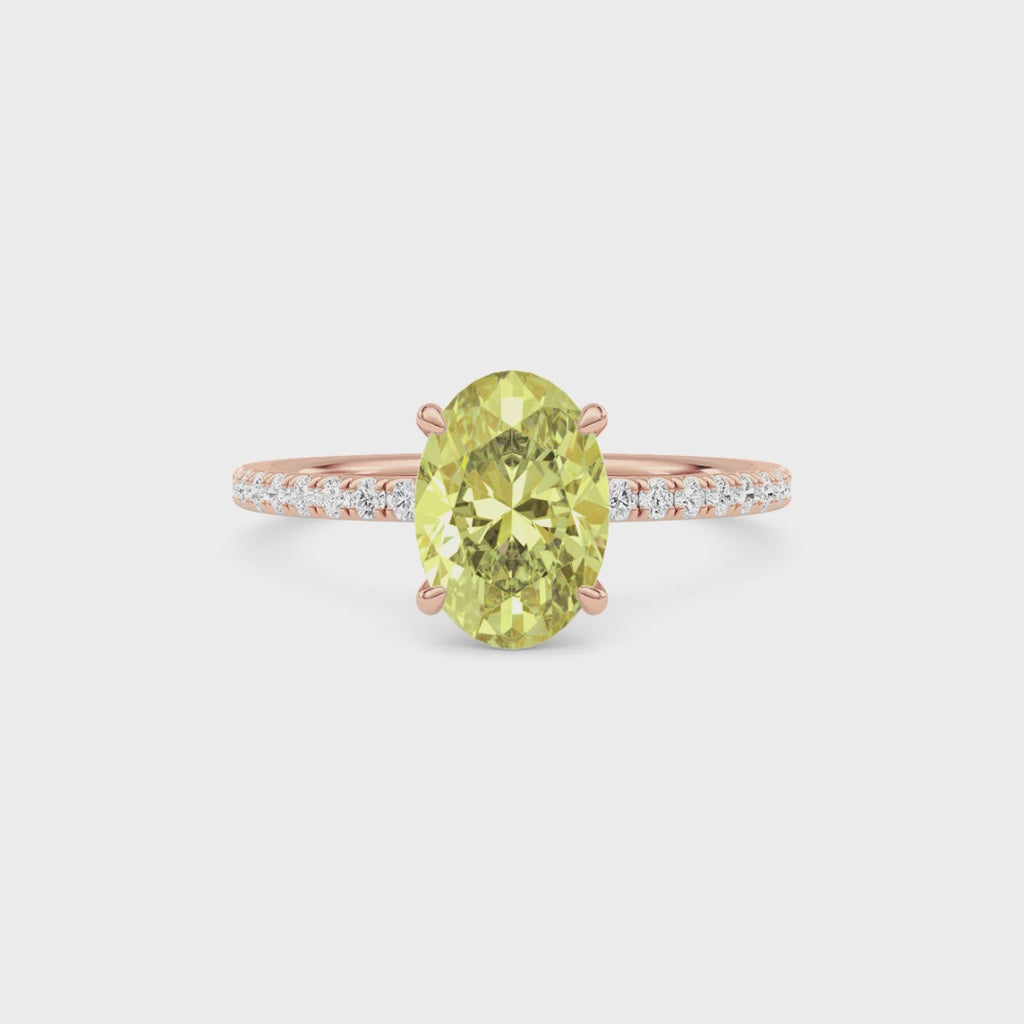 Rose gold Fancy Yellow Oval Cut Diamond Solitaire with Pavé Band
