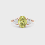 Rose gold Three-Stone Fancy Yellow Oval Cut Diamond Ring with Heart Side Stones