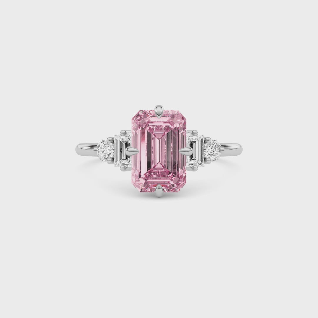 Silver Three-Stone Fancy Pink Emerald Cut Diamond Ring with Heart Side Stones