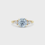 Yellow gold Three-Stone Fancy Blue Round Cut Diamond Ring with Trillion Side Stones