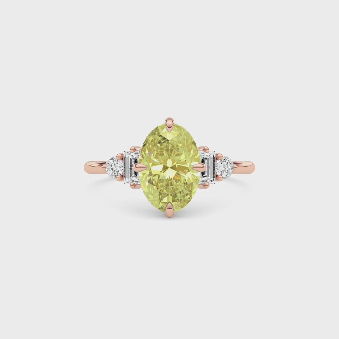 Rose gold Fancy Yellow Oval Cut Three Stone Diamond Engagement Ring with Tapered Baguette and Round Side Stones