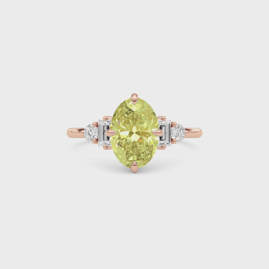 Rose gold Fancy Yellow Oval Cut Three Stone Diamond Engagement Ring with Tapered Baguette and Round Side Stones