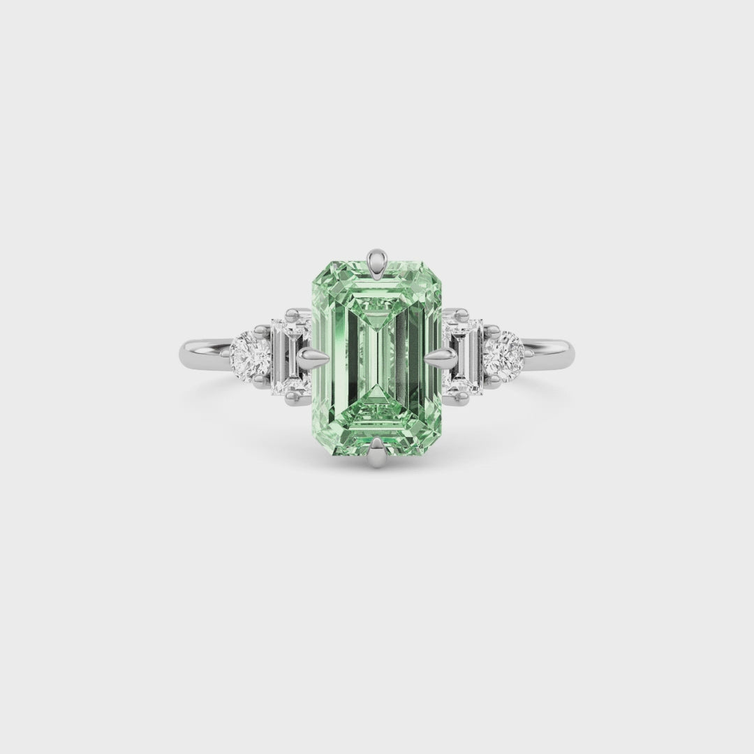 White gold Three-Stone Fancy Green Emerald Cut Diamond Ring with Heart Side Stones