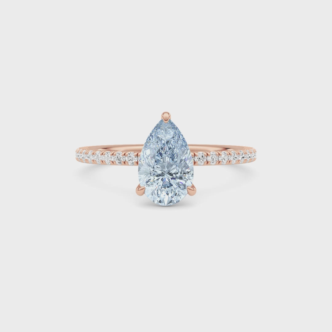Rose gold Fancy Blue Pear Cut Diamond Solitaire with Pavé Band