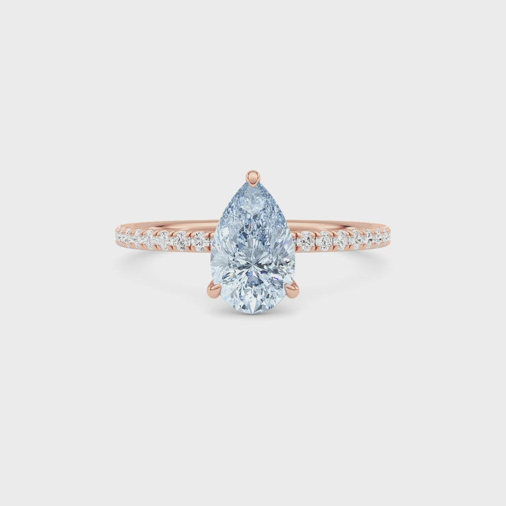 Rose gold Fancy Blue Pear Cut Diamond Solitaire with Pavé Band