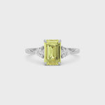 Yellow gold Three-Stone Fancy Yellow Emerald Cut Diamond Ring with Trillion Side Stones