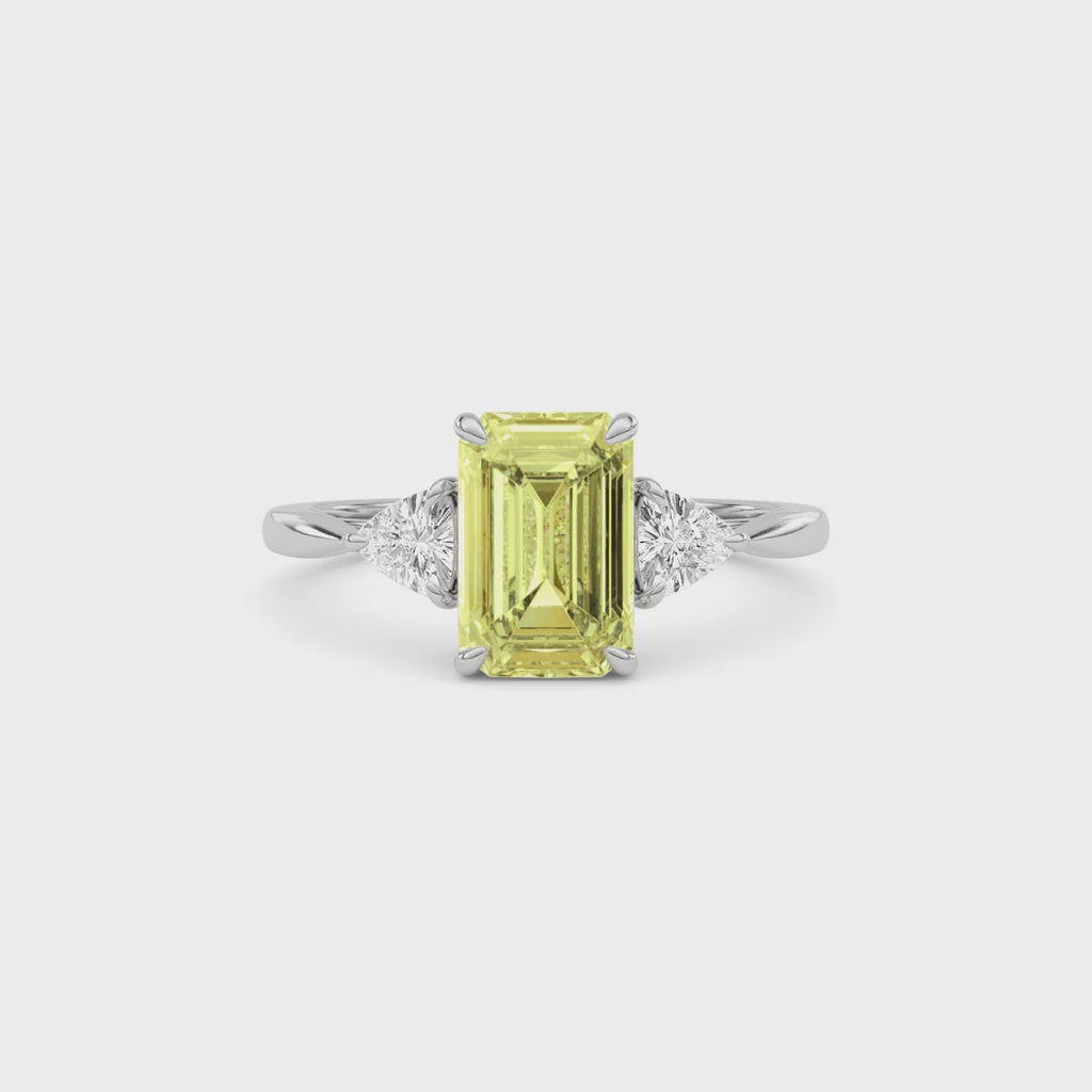 Yellow gold Three-Stone Fancy Yellow Emerald Cut Diamond Ring with Trillion Side Stones