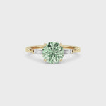 Yellow gold Three-Stone Fancy Green Round Cut Diamond Ring with Tapered Baguette Side Stones
