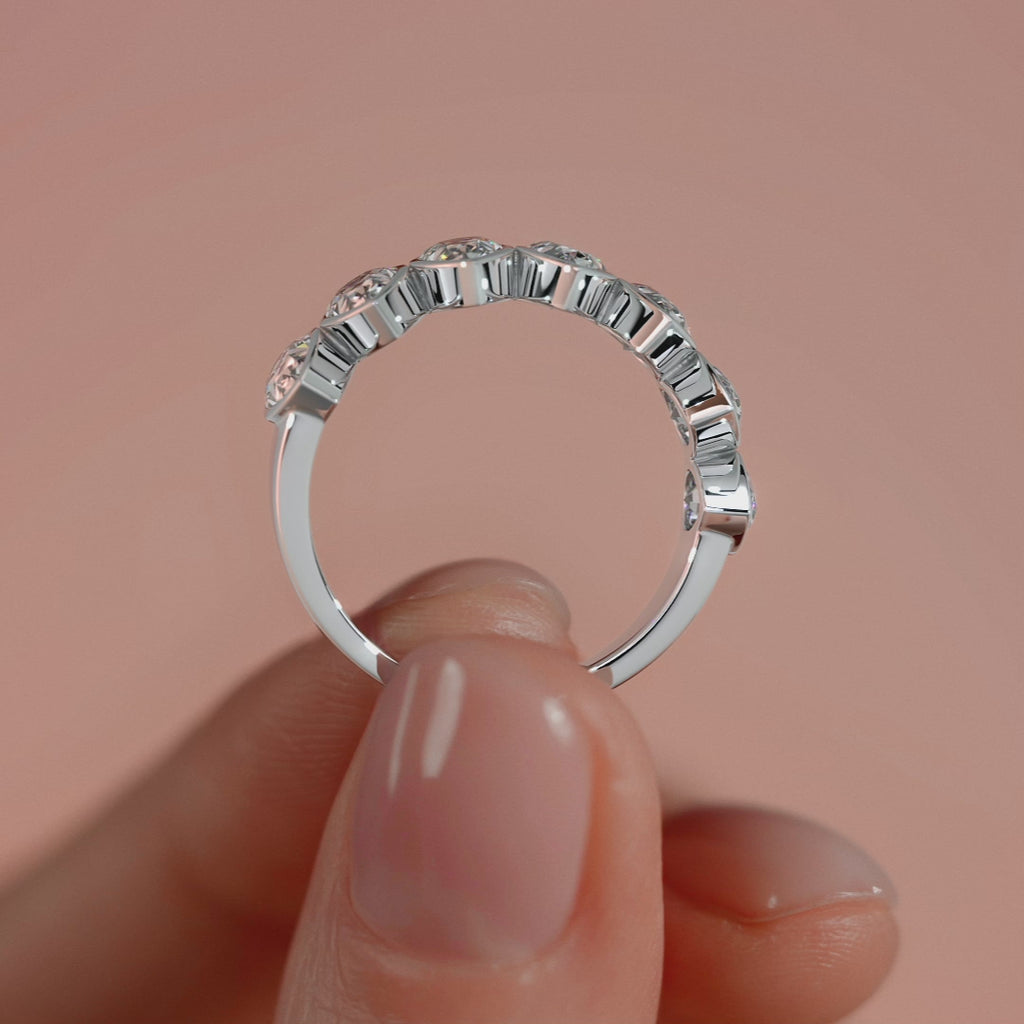 Platinum Pear Cut Diamond Half Eternity Band with Bezel Setting