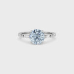 White gold Three-Stone Fancy Blue Round Cut Diamond Ring with Tapered Baguette Side Stones