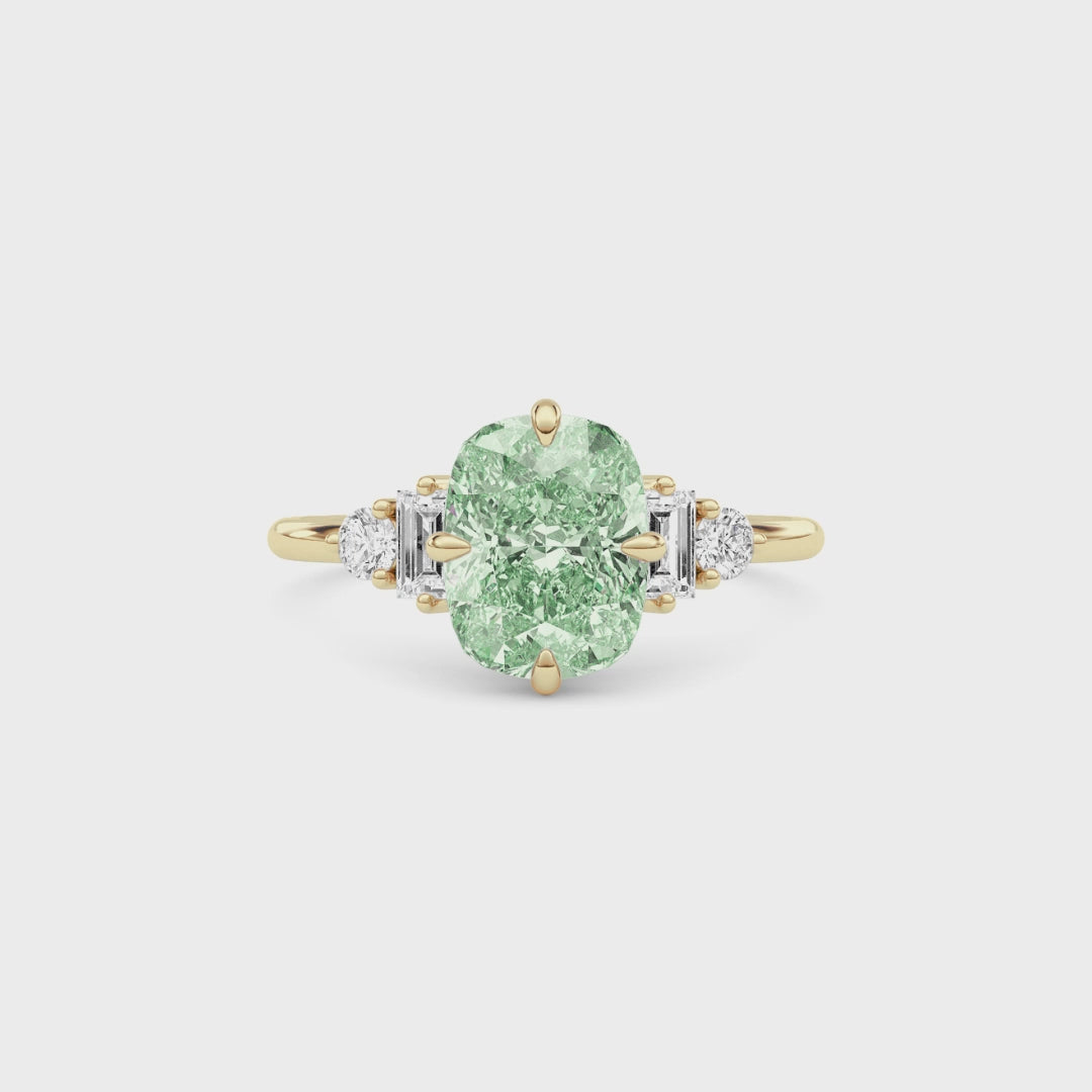 Yellow gold Fancy Green Cushion Cut Three Stone Diamond Engagement Ring with Tapered Baguette and Round Side Stones