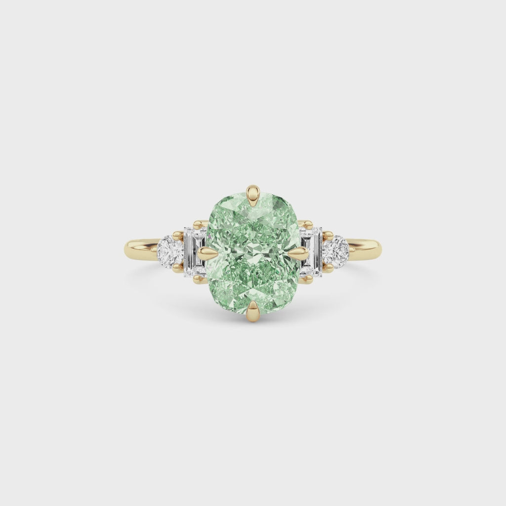 Yellow gold Fancy Green Cushion Cut Three Stone Diamond Engagement Ring with Tapered Baguette and Round Side Stones