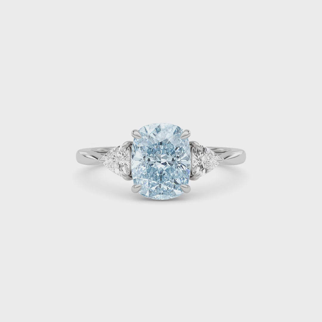 Silver Three-Stone Fancy Blue Cushion Cut Diamond Ring with Trillion Side Stones