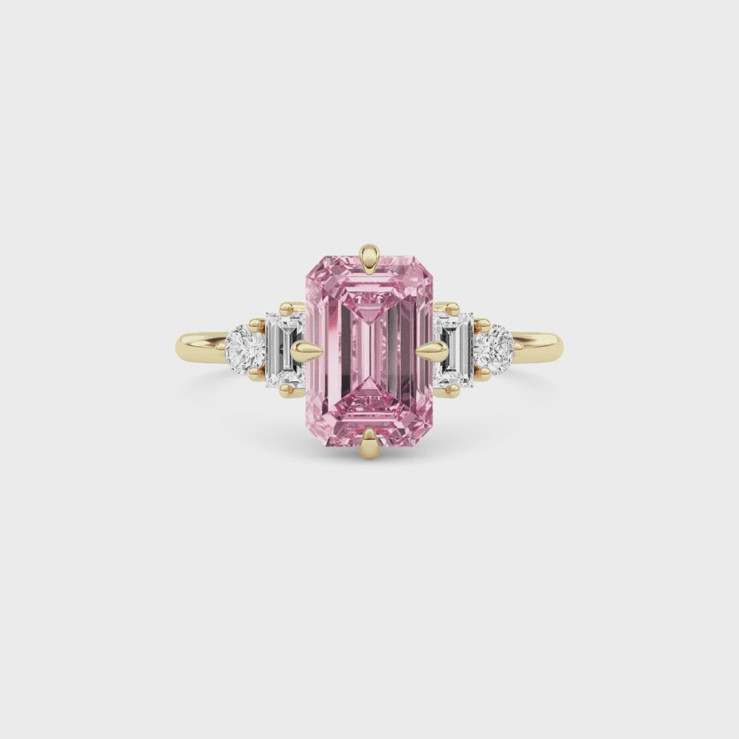 Yellow gold Three-Stone Fancy Pink Emerald Cut Diamond Ring with Heart Side Stones