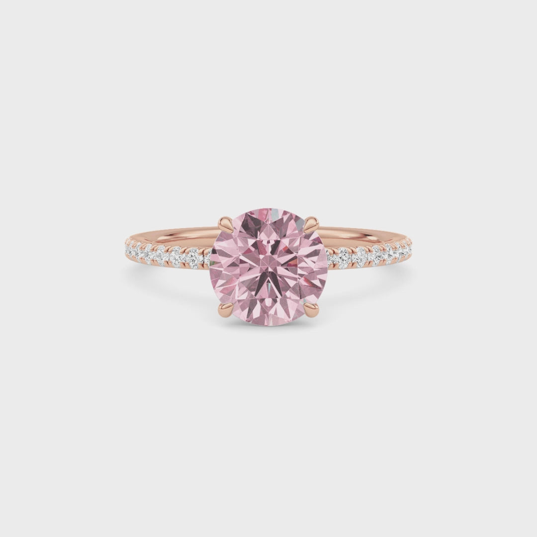 Rose gold Fancy Pink Round Cut Diamond Solitaire with Pavé Band