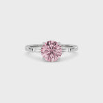 Platinum Three-Stone Fancy Pink Round Cut Diamond Ring with Tapered Baguette Side Stones